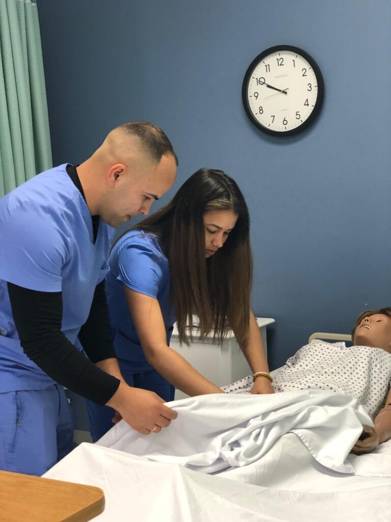 FVI students participate in a a nursing assistant lab