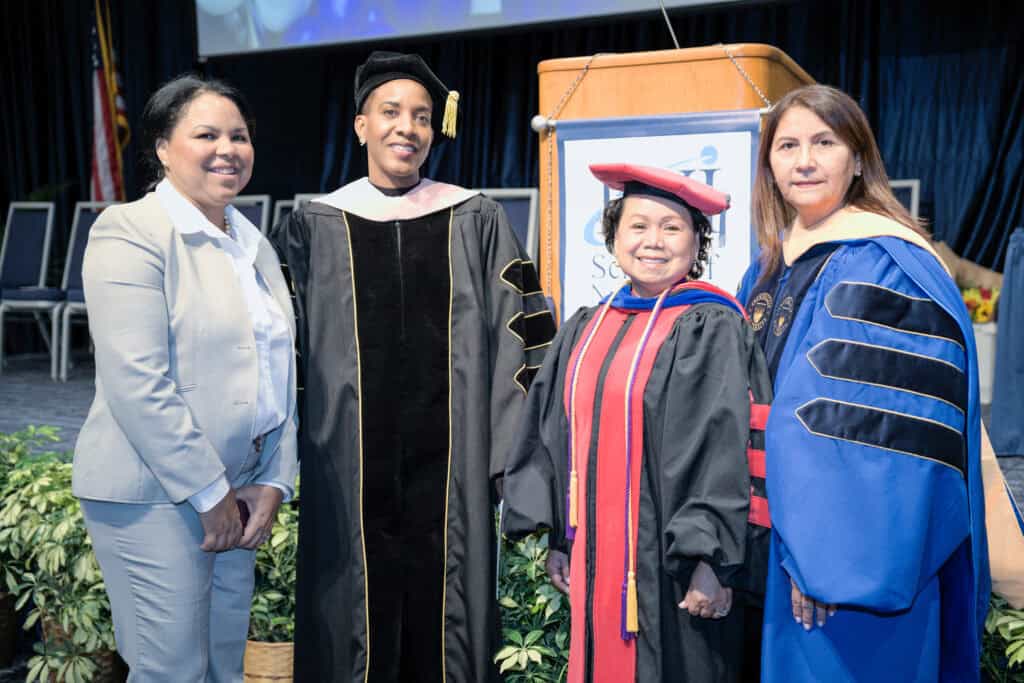 FVI nursing faculty with guest speaker
