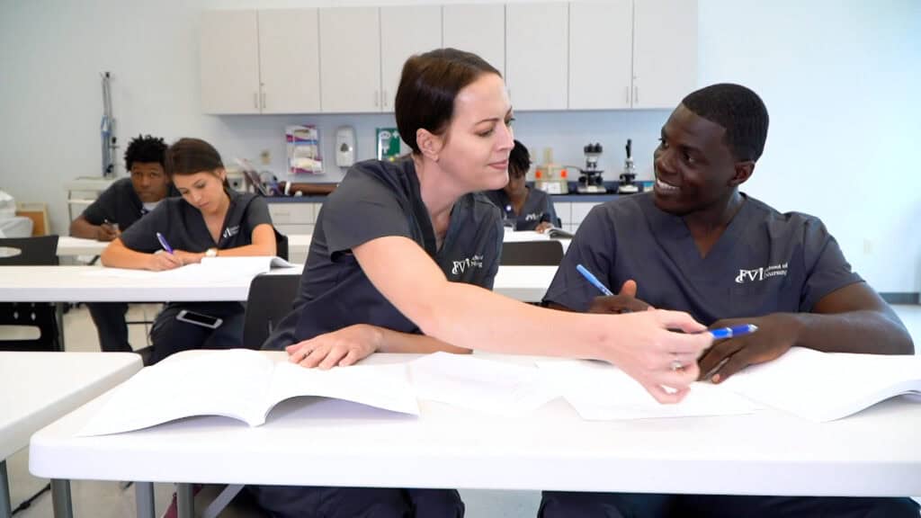 nursing students working together in the classroom